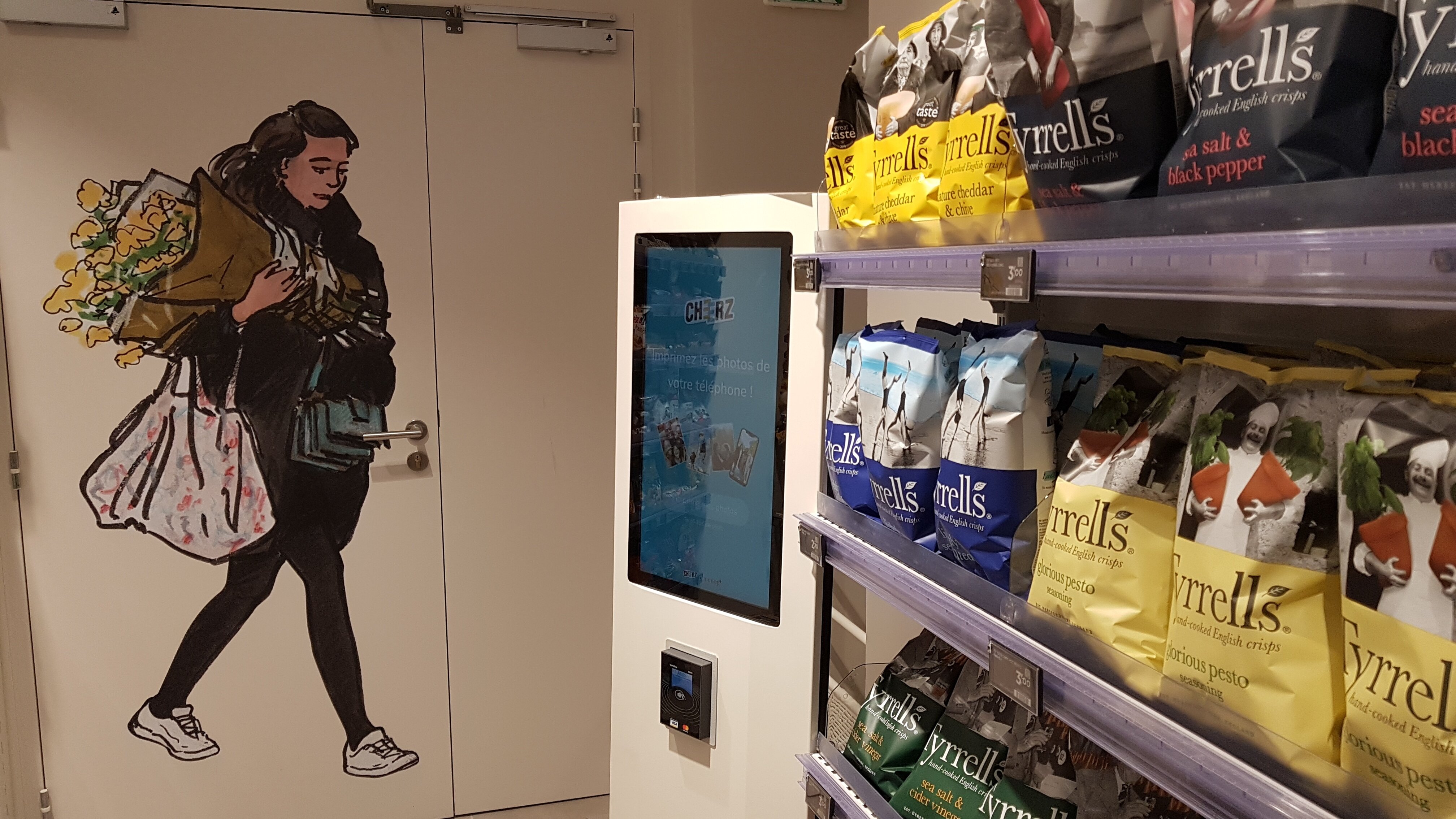 Une borne permet d’imprimer des photos depuis son smartphone. - © CC / Républik Retail